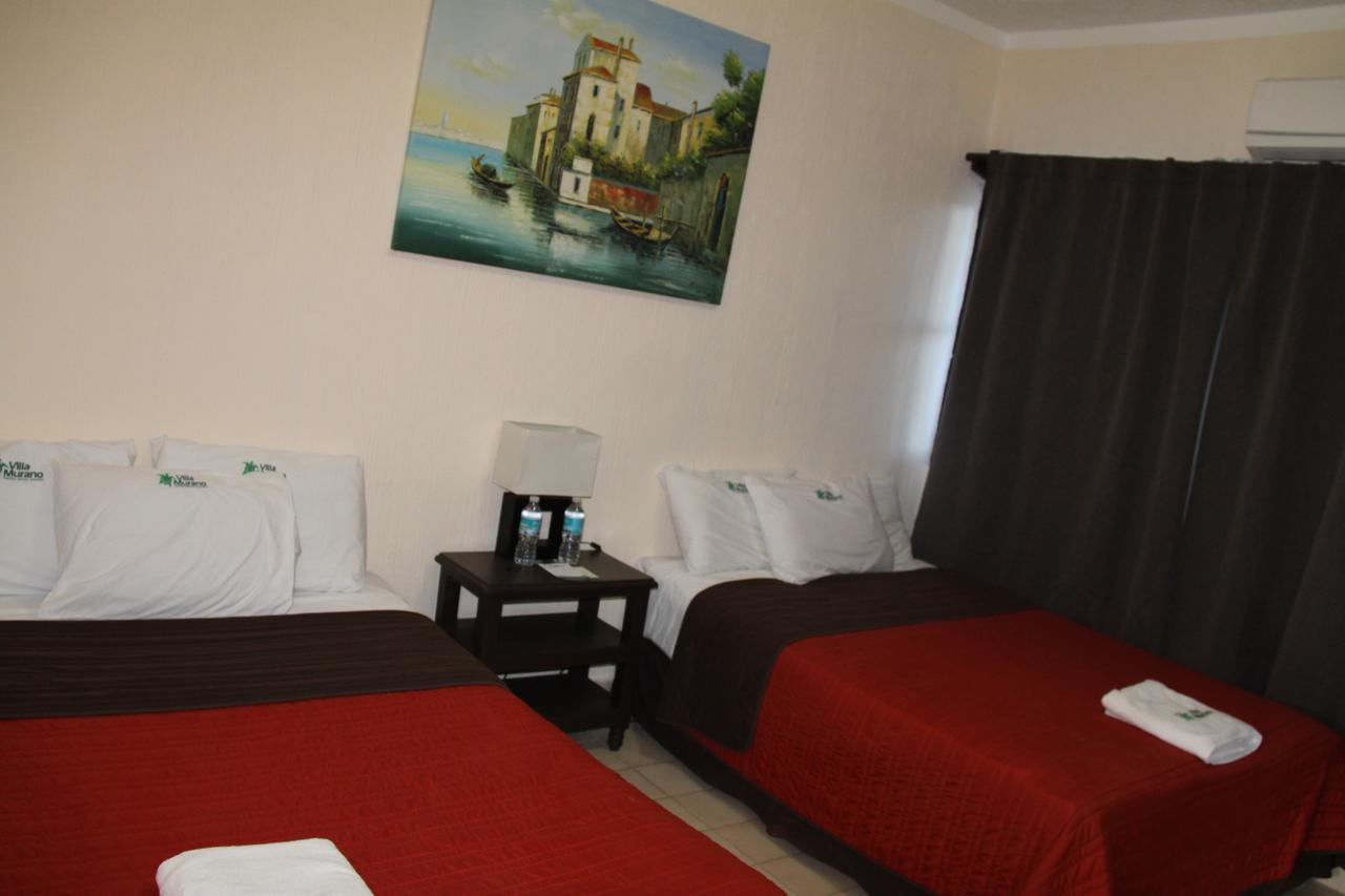 Hotel Villa Murano Пуерто Ариста Екстериор снимка
